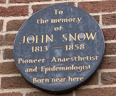 Plaque at side of hotel