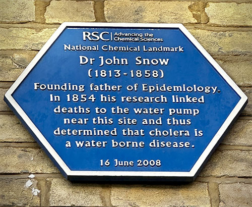 blue plaque honoring Snow