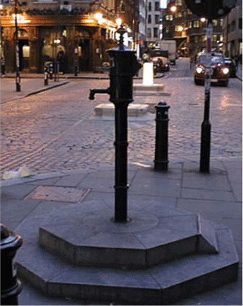 night view of pump replica and pub